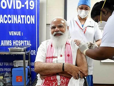 India's Modi gets Covid-19 jab as chaotic expansion of vaccine drive begins