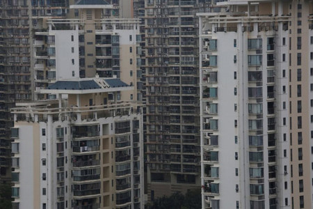 China's new home prices accelerate in Feb, property investment soars