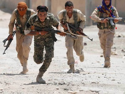 Kurdish fighters, pro-Turkey rebels clash in north Syria