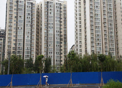 China's home prices extend gains in March, defy renewed curbs