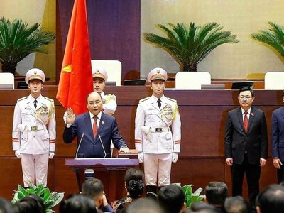Vietnam's pandemic response leader sworn in as president