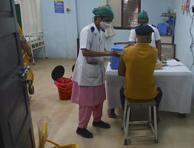 India's vaccinations fall from peak, raw-material shortage hits output targets