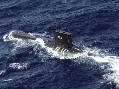Indonesia military says missing submarine sank with dozens aboard Indonesia military says missing submarine sank with dozens aboard