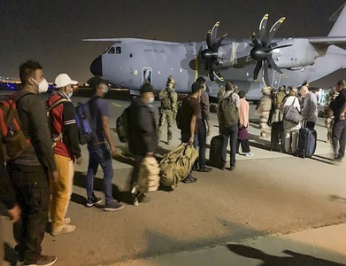 Over 600 Afghans cram into US cargo plane in desperate flight from Kabul