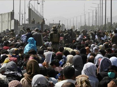 Taliban blame US for airport chaos as Afghans face 'impossible' race to flee Taliban blame US for airport chaos as Afghans face 'impossible' race to flee