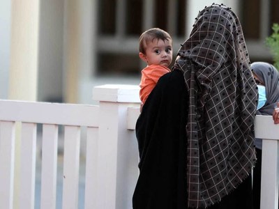 Housed in Qatar's World Cup complex, Afghan refugees fear for families