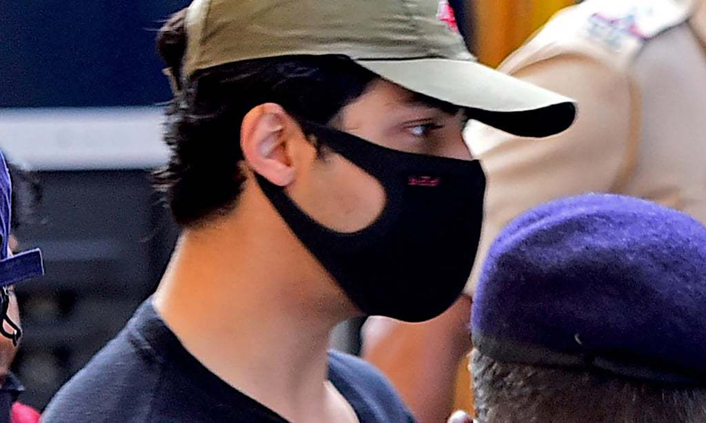 Son of Bollywood star Shah Rukh Khan in custody in drugs probe