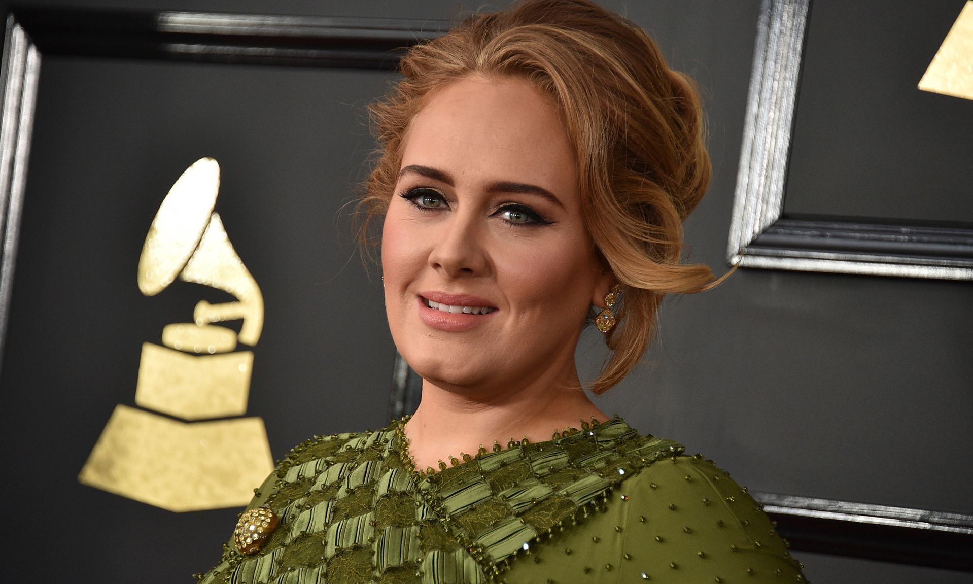 Adele teases new music with video clip