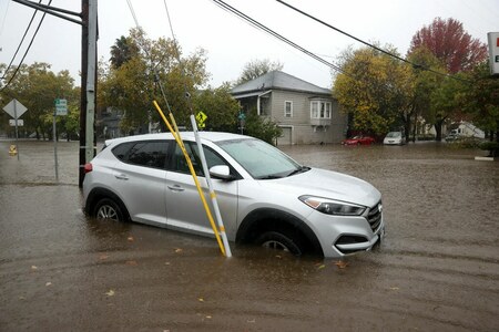 Mudslides, power outages as storm drenches burn-scarred California