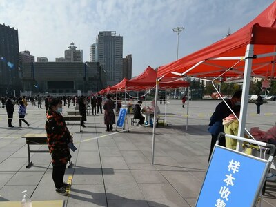 China locks down city of four million over Covid cases