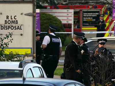 British police arrest three men after deadly car blast