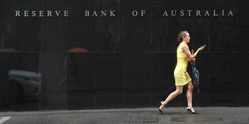Australia's central bank sticks with policy patience, no rush to taper