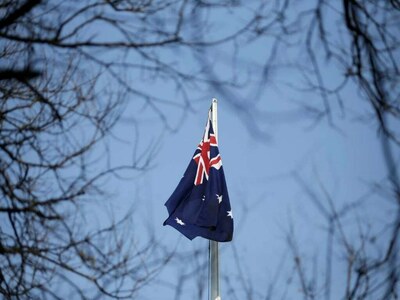 Australia COVID-19 cases surge, hospitalisations hit pandemic high in most populous state
