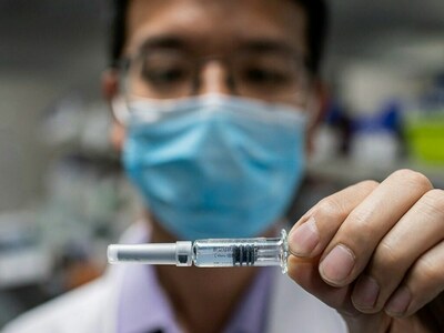 Australia swamped by Omicron surge as pressure grows on hospitals