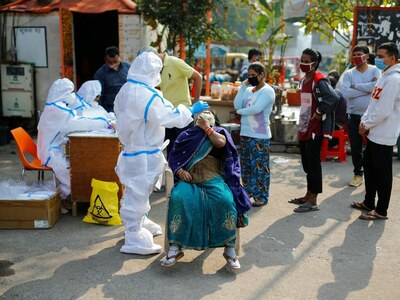 India extends ban on public events in election states as COVID cases rise