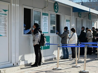 Beijing tightens rules for entering city after Omicron case