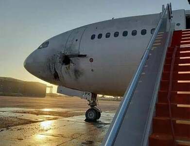 Rockets hit Baghdad airport compound, disused civilian plane damaged