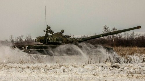 Russia says video shows its western army tanks returning from drills