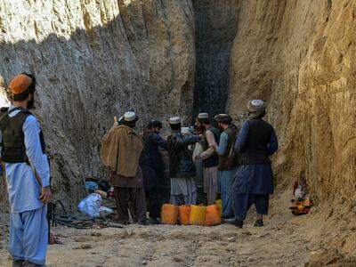 Rescuers battle to save boy trapped down Afghan well