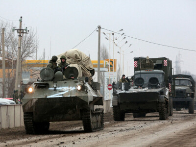 Russian forces squeeze Kyiv, surround Mariupol