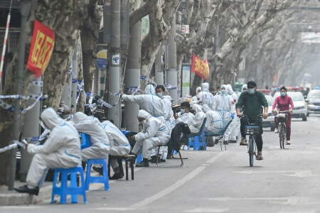 China locks down city of 9 million as virus ripples across country
