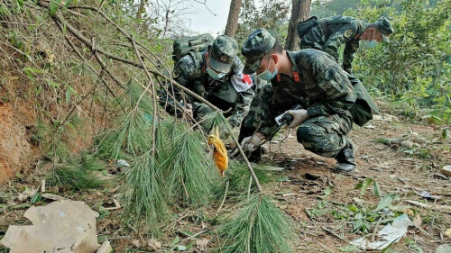 Recovery of crashed China Eastern jet hampered by heavy rain