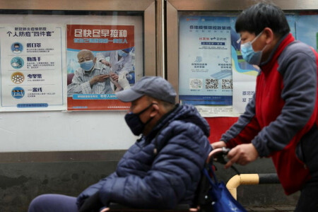 With carrot and stick, China presses ahead with COVID vaccinations for elderly