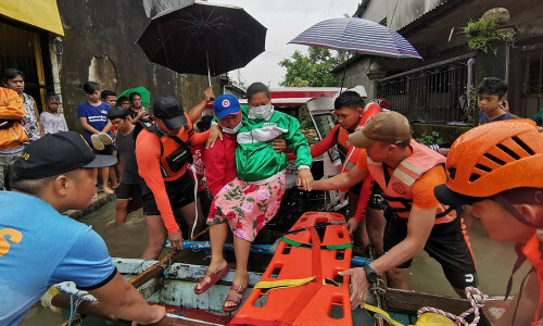 Search for survivors in Philippine villages hit by landslides