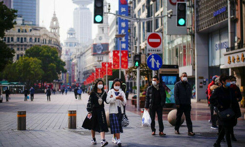 More Chinese cities tighten controls as Shanghai COVID cases rise