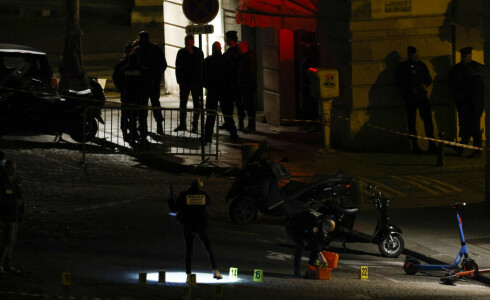 Police fire on car in central Paris, killing two people