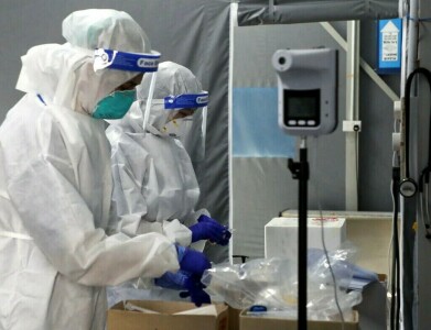 Beijing Covid spike prompts mass testing, panic buying