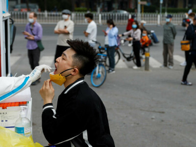 Beijing tightens Covid restrictions as long holiday begins