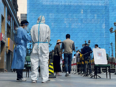 Beijing steps up COVID curbs as virus spreads in China