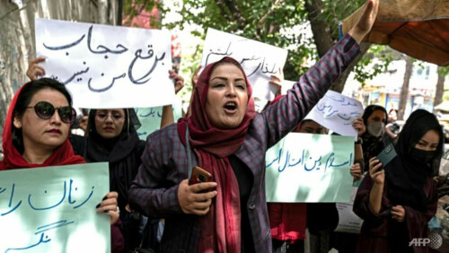 Afghan women protest Taliban decree to cover faces
