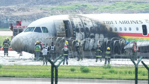 Tibet Airlines passenger jet catches fire