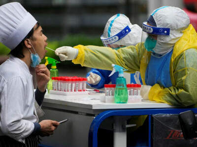 Shanghai hunkers down for final COVID battle, Beijing outbreak stubborn