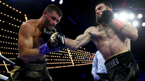 Beterbiev batters Smith to unify light-heavy belts Beterbiev batters Smith to unify light-heavy belts