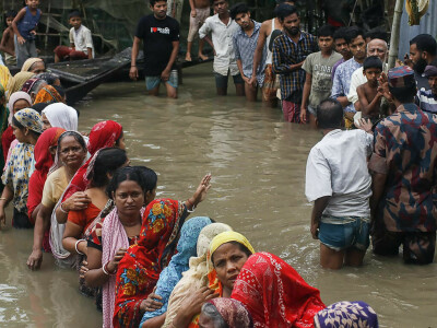 Bangladesh, India race to help millions stranded in deadly flooding