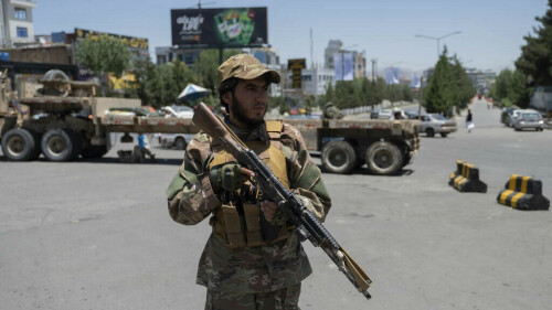 Thousands gather at all-male meeting to rubber-stamp Taliban rule