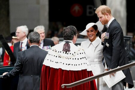 Cheers and some jeers as Prince Harry and Meghan return to UK
