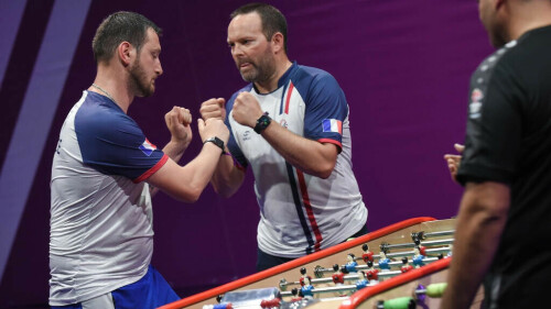 Players twist for glory at the table football World Cup