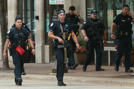 Police arrest suspect after gunman kills six at US July 4 parade