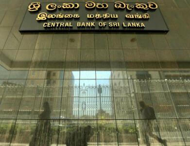 Sri Lanka central bank chief signals he will stay in job, warns turmoil impedes IMF talks
