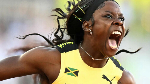 Jackson edges Fraser-Pryce to win world 200m gold