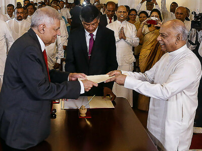 Sri Lankan security forces raid protest camp as new leaders sworn in