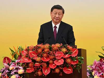 In Hong Kong, Xi says 'one country, two systems' is here to stay