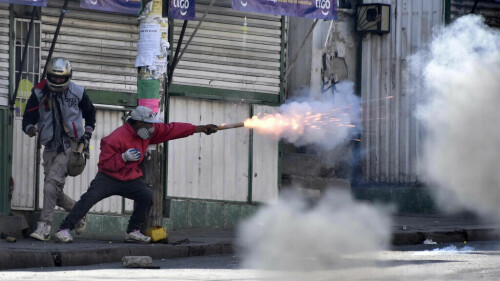 Clashes erupt in Bolivia capital between police and coca farmers
