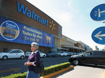 Walmart sees smaller profit drop this year as discounts spur demand