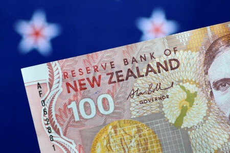 NZ dollar jumps after rate hike, hawkish stance; Aussie hit by jobs data miss
