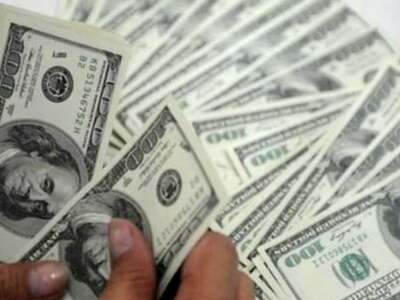 Dollar slides on contraction in private sector activity